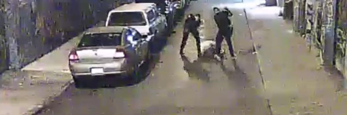 Two Alameda County Sheriff deputies are shown beating a man on a street in San Francisco's Mission District in a video provided by the San Francisco Public Defender's Office