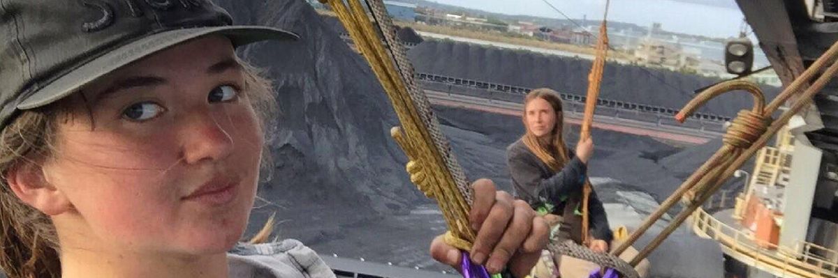 Two climate action campaigners held a protest at the world's largest coal port