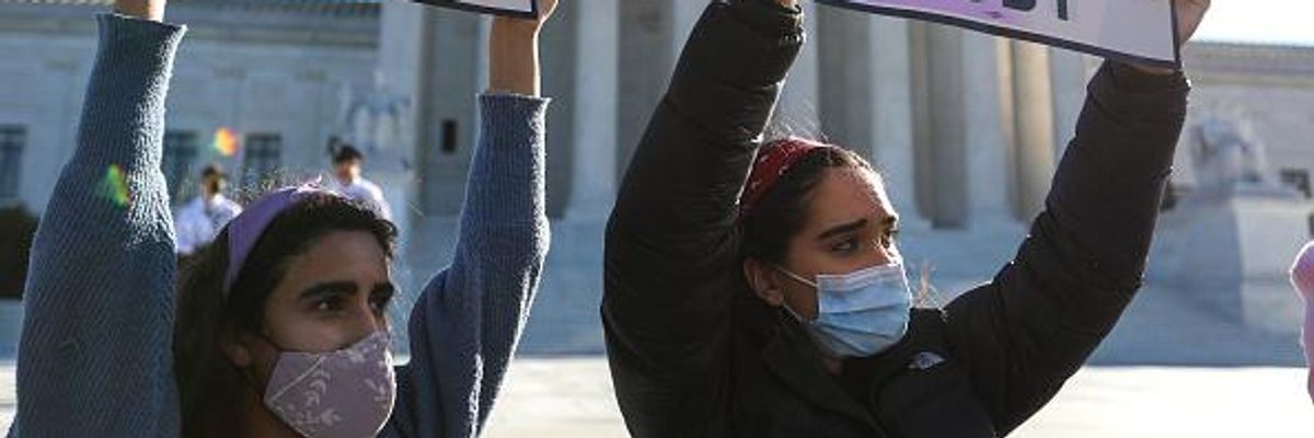 Two demonstrators at a pro-choice demonstration at the Supreme Court