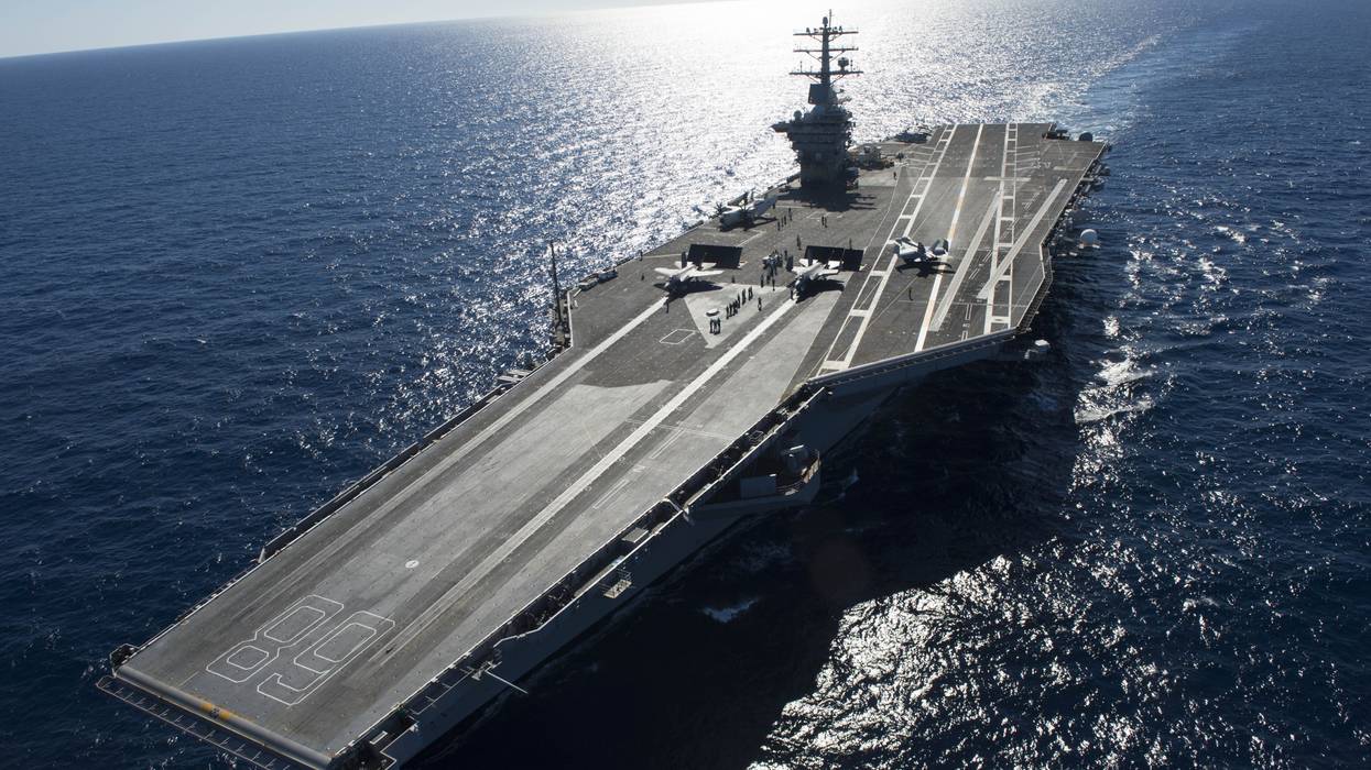 Two F-35C Lightning II carrier variant joint strike fighters conduct the first catapult launches aboard the aircraft carrier USS Nimitz (CVN 68).