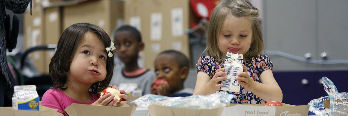 Two girls have lunch
