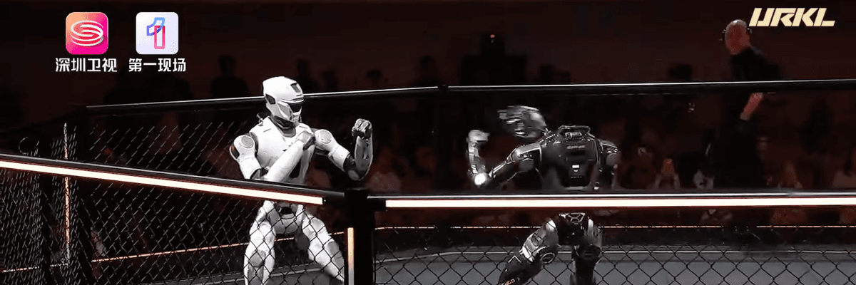 Two humanoid robots fight at the Ultimate Robot Knock-out Legend
