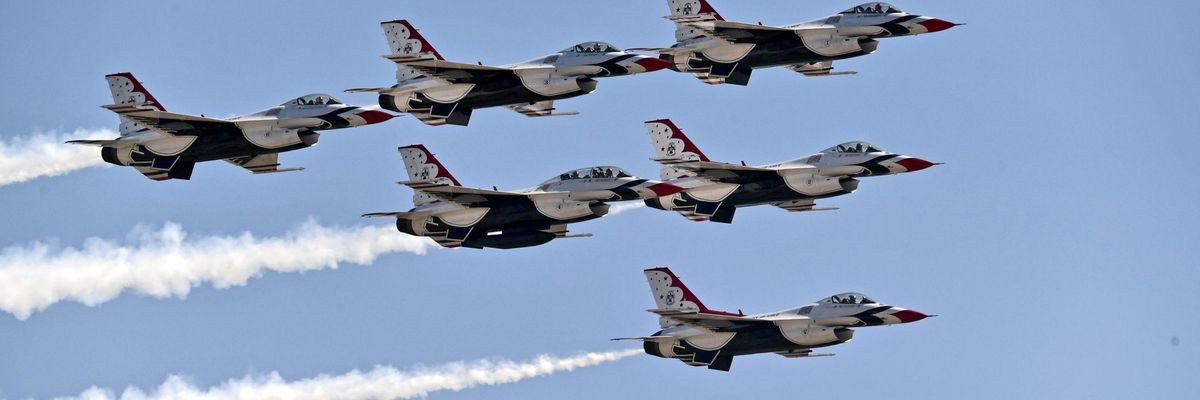 U.S. Air Force fighter jets fly in formation.