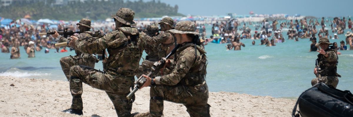 U.S. Army members perform exercises on Miami beach.