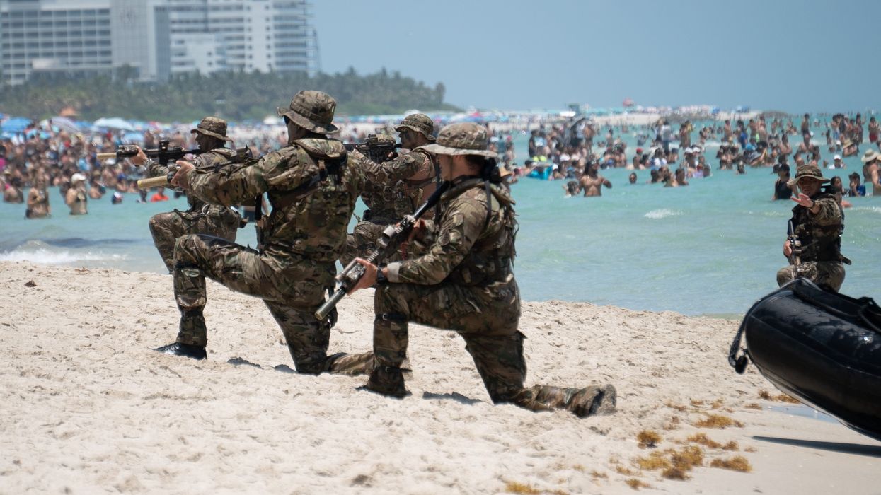 U.S. Army members perform exercises on Miami beach.