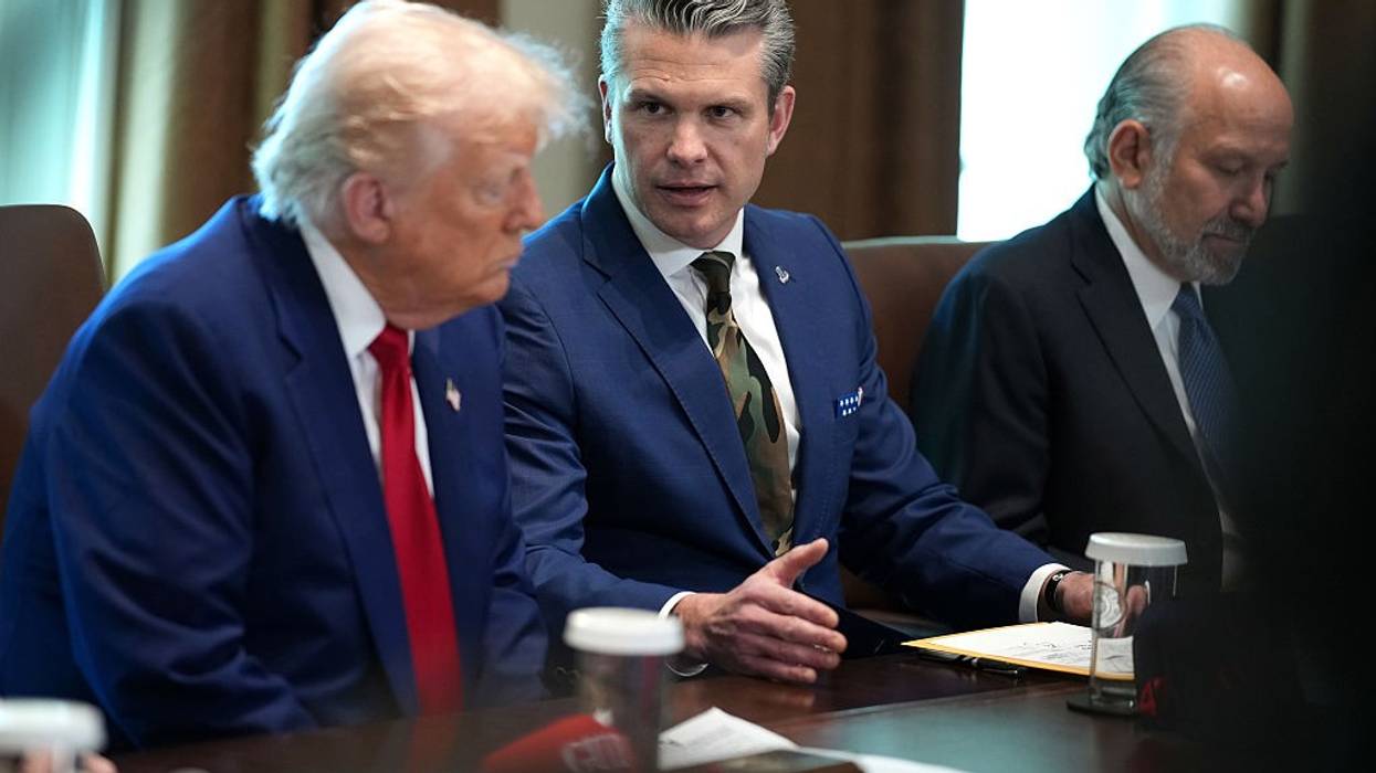 U.S. Defense Secretary Pete Hegseth and President Donald Trump