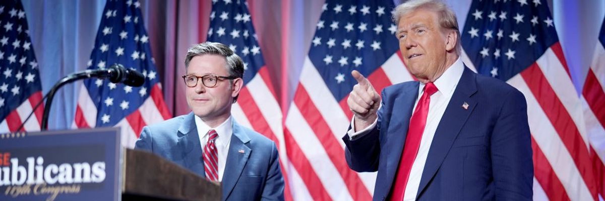 U.S. House Speaker Mike Johnson and President-elect Donald Trump appear on stage together