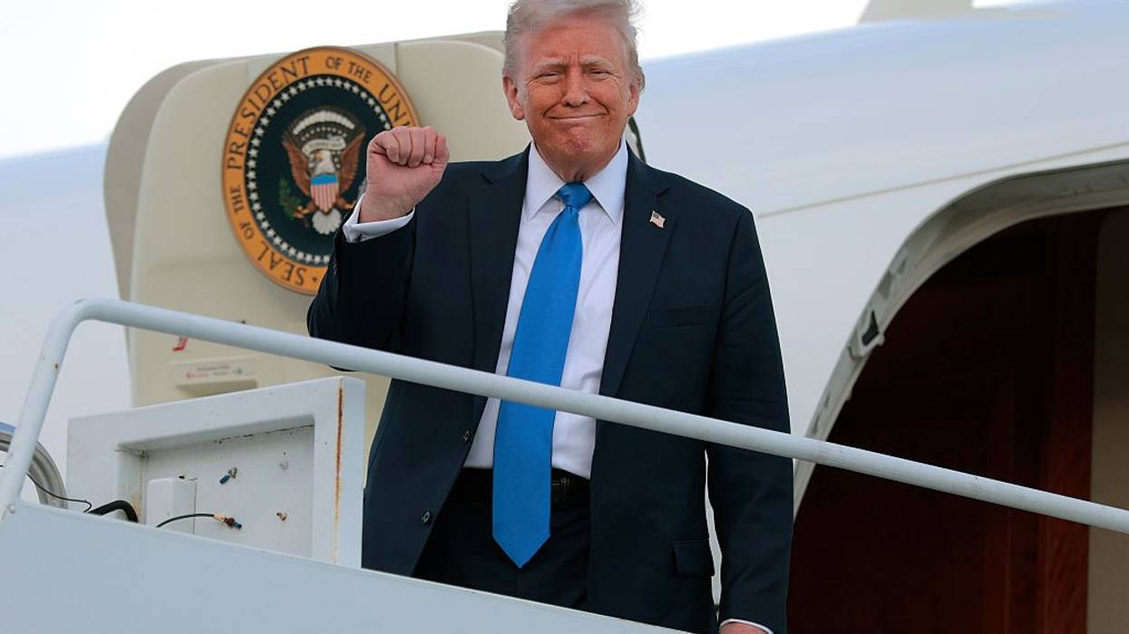 U.S. President Donald Trump disembarks from Air Force One