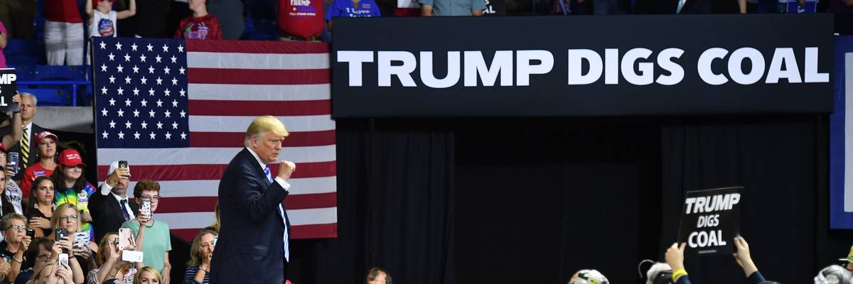 U.S. President Donald Trump salutes his supporters
