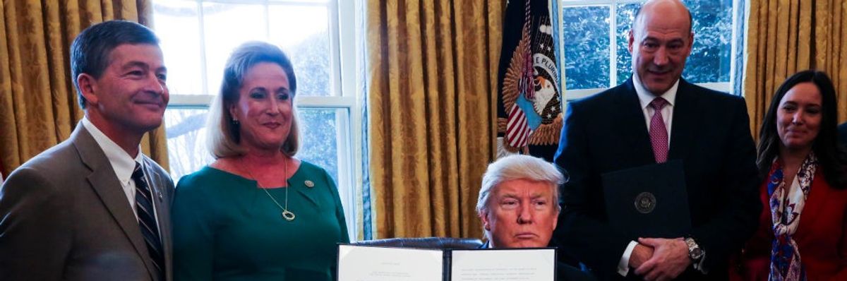 U.S. President Donald Trump signs Executive Orders