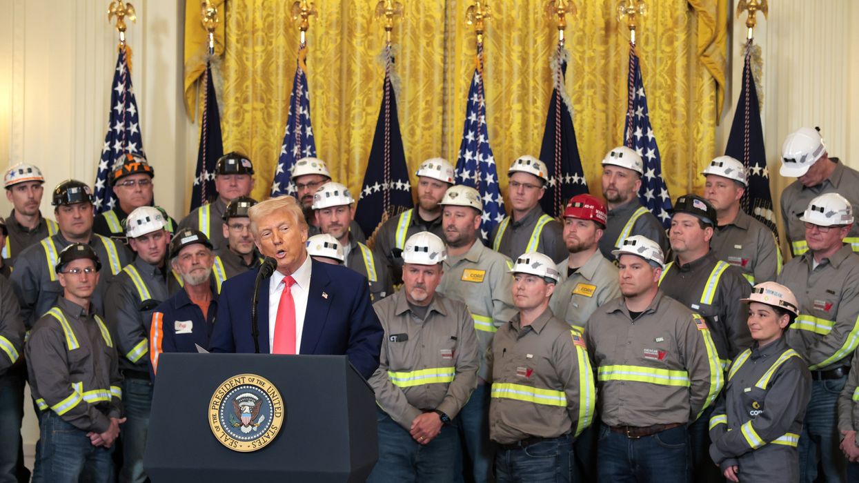 U.S. President Donald Trump speaks alongside coal and energy workers