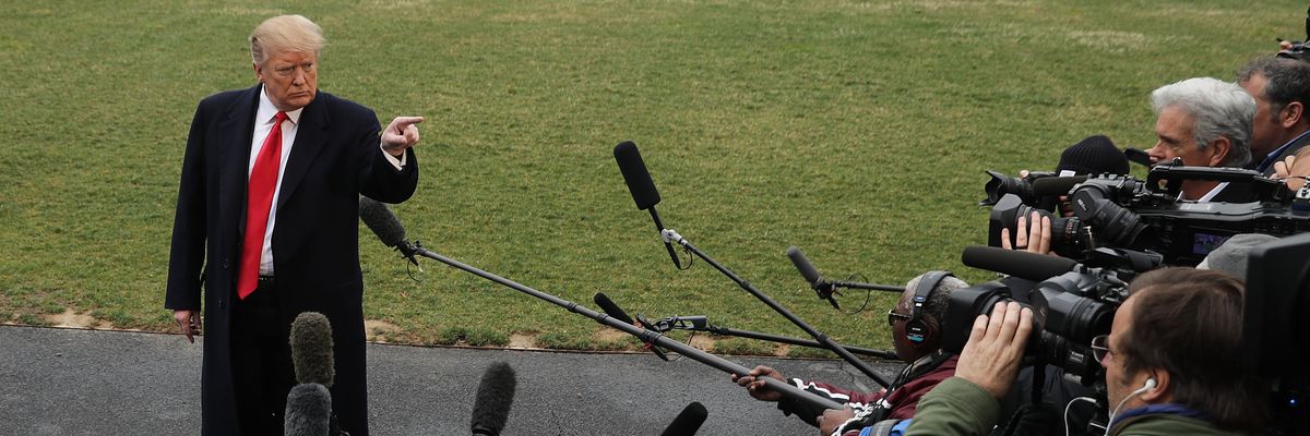 U.S. President Donald Trump talks to reporters