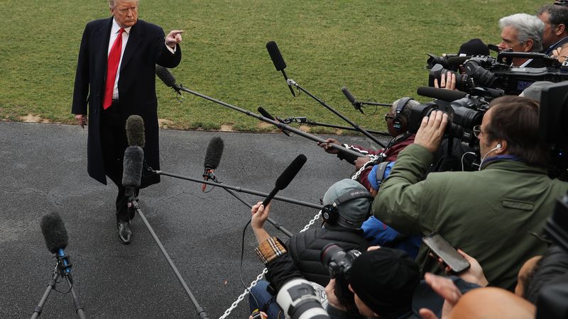 U.S. President Donald Trump talks to reporters