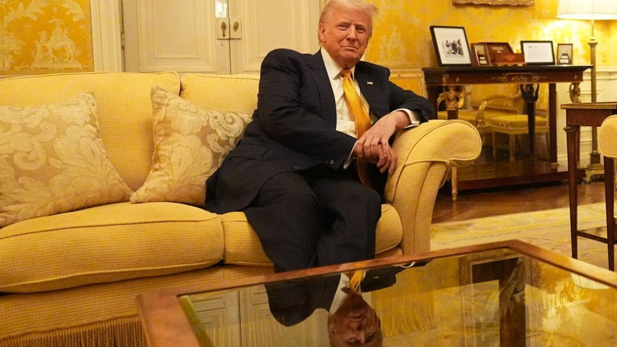 U.S. President-elect Donald Trump sits in the Salon Jaune room