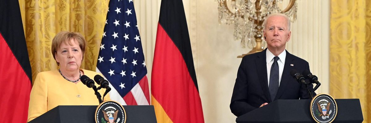 U.S. President Joe Biden and German Chancellor Angela Merkel speak at a press conference
