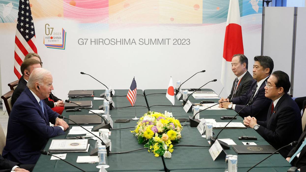U.S. President Joe Biden and Japanese Prime Minister Fumio Kishida attend the G7 meeting