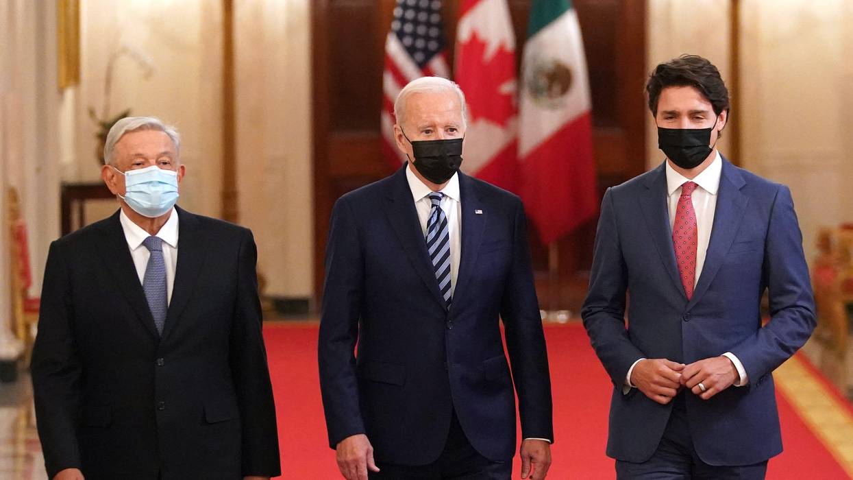 U.S. President Joe Biden (CU.S. President Joe Biden (C), Canadian Prime Minister Justin Trudeau (R) and Mexican President Andres Manuel Lopez Obrador