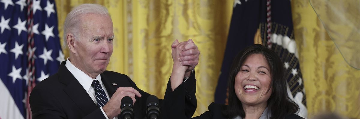 U.S. President Joe Biden holds hands with Julie Su, his nominee to be the next Labor secretary, during an event in the East Room of the White House in Washington, D.C. on March 1, 2023.