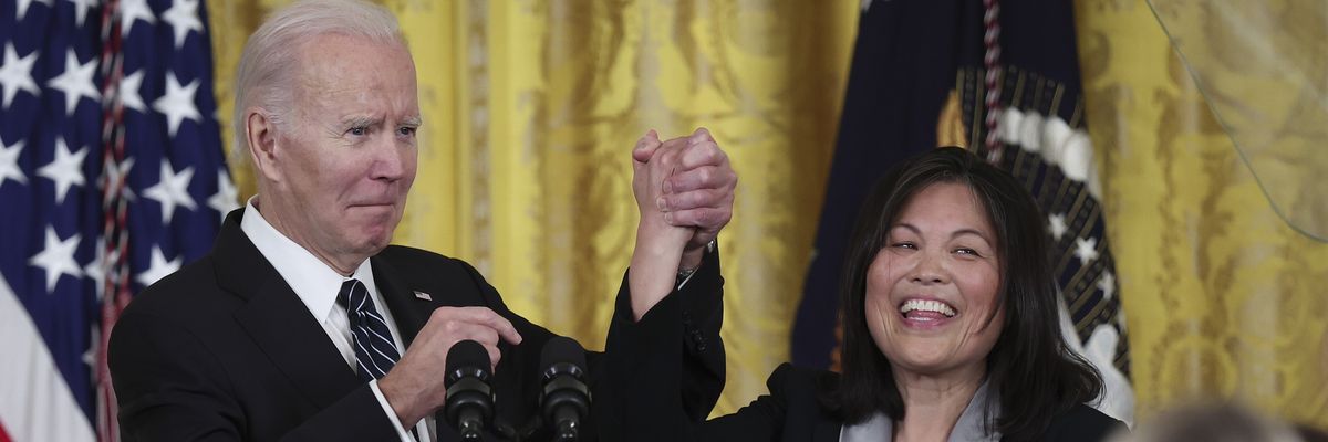 U.S. President Joe Biden holds hands with Julie Su, his nominee to be the next Labor secretary, during an event in the East Room of the White House in Washington, D.C. on March 1, 2023.