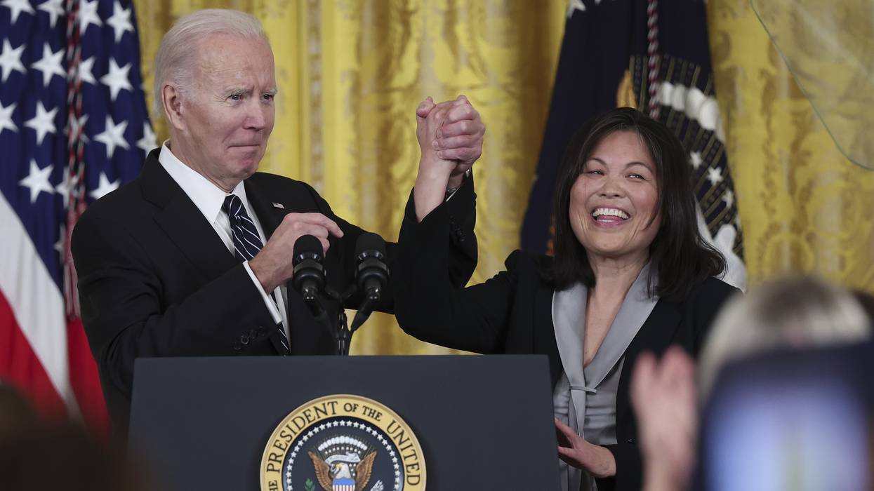 U.S. President Joe Biden holds hands with Julie Su, his nominee to be the next Labor secretary, during an event in the East Room of the White House in Washington, D.C. on March 1, 2023.