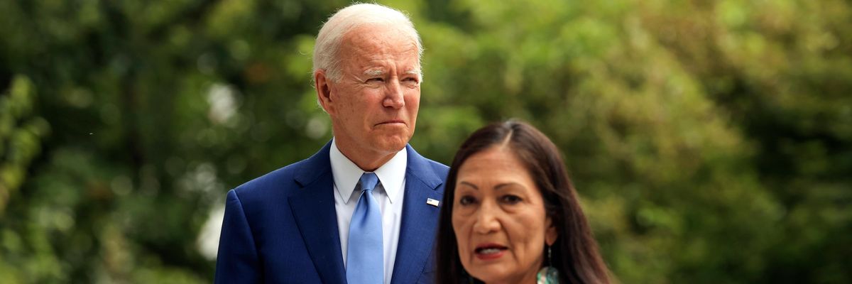 U.S. President Joe Biden listens as Secretary of the Interior Deb Haaland speaks at the White House on October 8, 2021 in Washington, D.C.