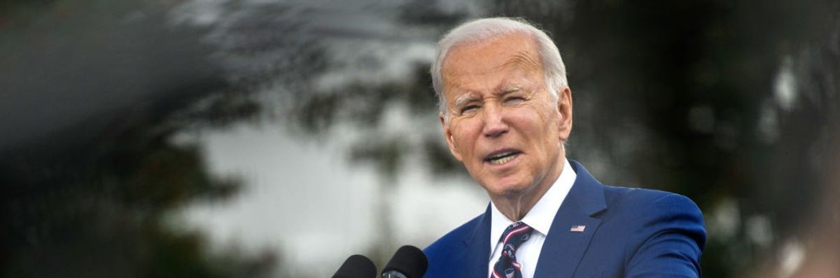U.S. President Joe Biden speaks at podium