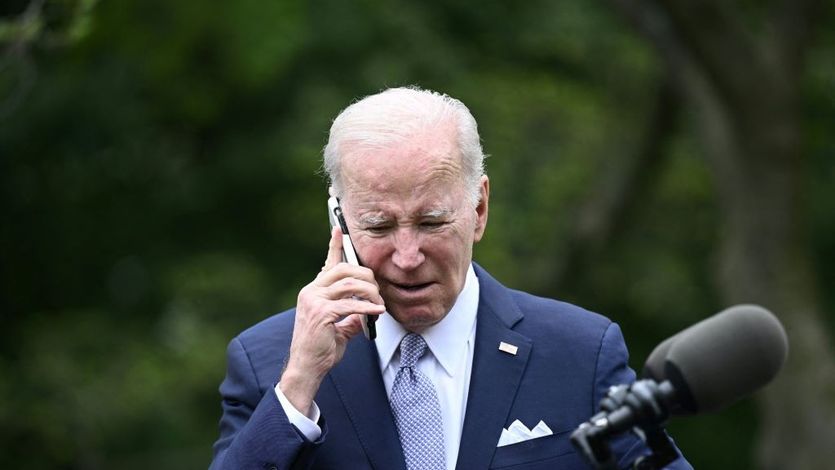 U.S. President Joe Biden speaks on the phone