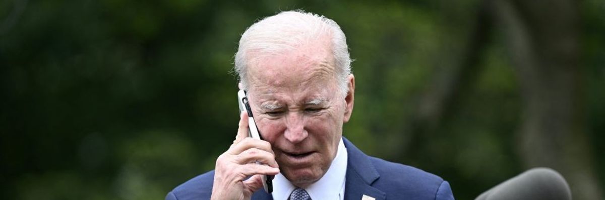 U.S. President Joe Biden speaks on the phone