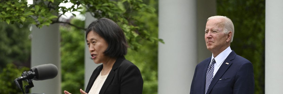 U.S. President Joe Biden watches as U.S. Trade Representative Katherine Tai speaks outside the White House on May 17, 2022.