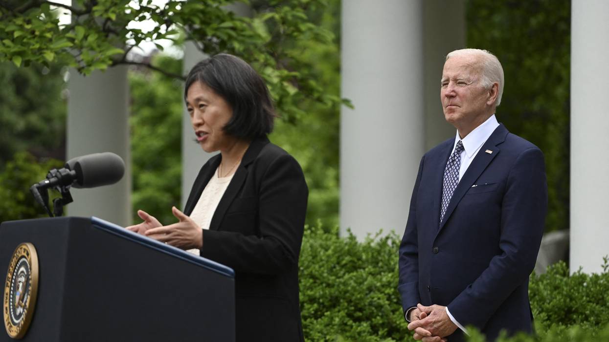 U.S. President Joe Biden watches as U.S. Trade Representative Katherine Tai speaks outside the White House on May 17, 2022.