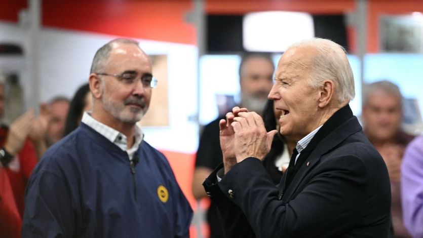 U.S. President Joe Biden with UAW president Shawn Fain as the presidetnt speaks to members of the United Auto Workers
