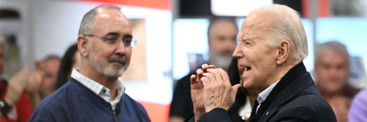 U.S. President Joe Biden with UAW president Shawn Fain as the presidetnt speaks to members of the United Auto Workers