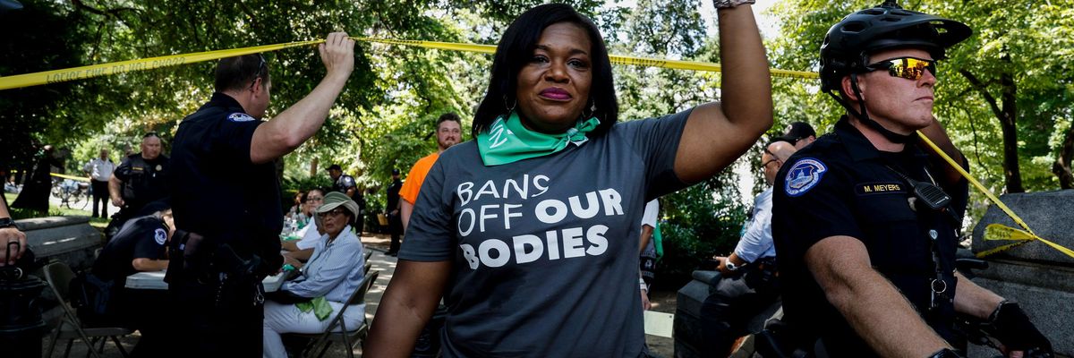 U.S. Rep. Cori Bush (D-Mo.) leaves a processing area after being arrested in front of the U.S. Supreme Court Building on July 19, 2022 in Washington, D.C.