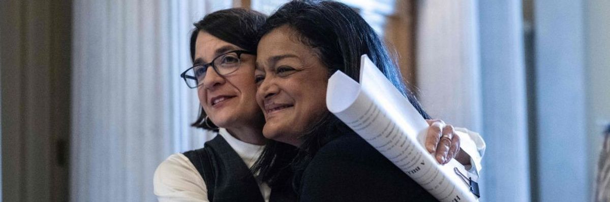U.S. Representatives Becca Balint and Pramila Jayapal embrace.