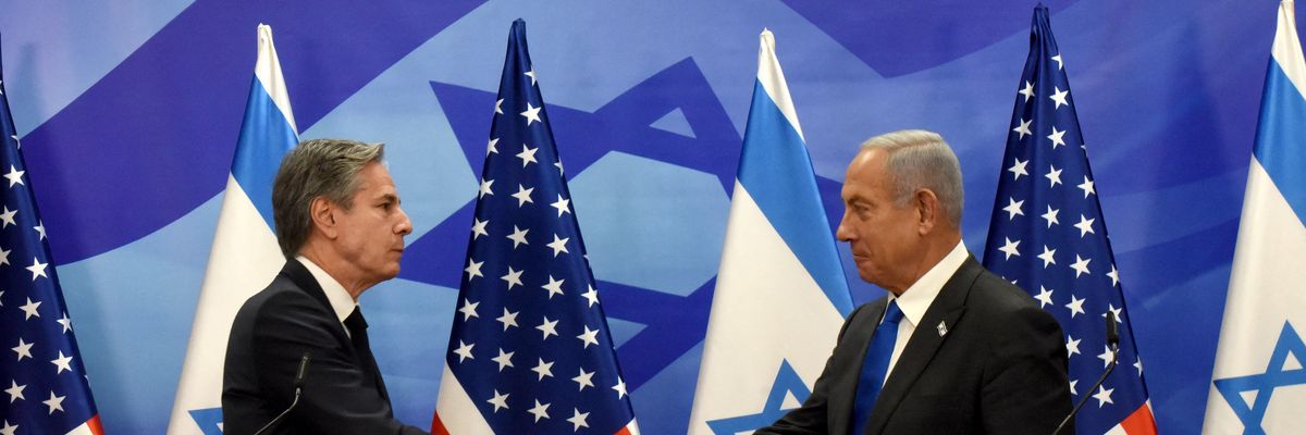U.S. Secretary of State Antony Blinken shakes hands with Israeli Prime Minister Benjamin Netanyahu