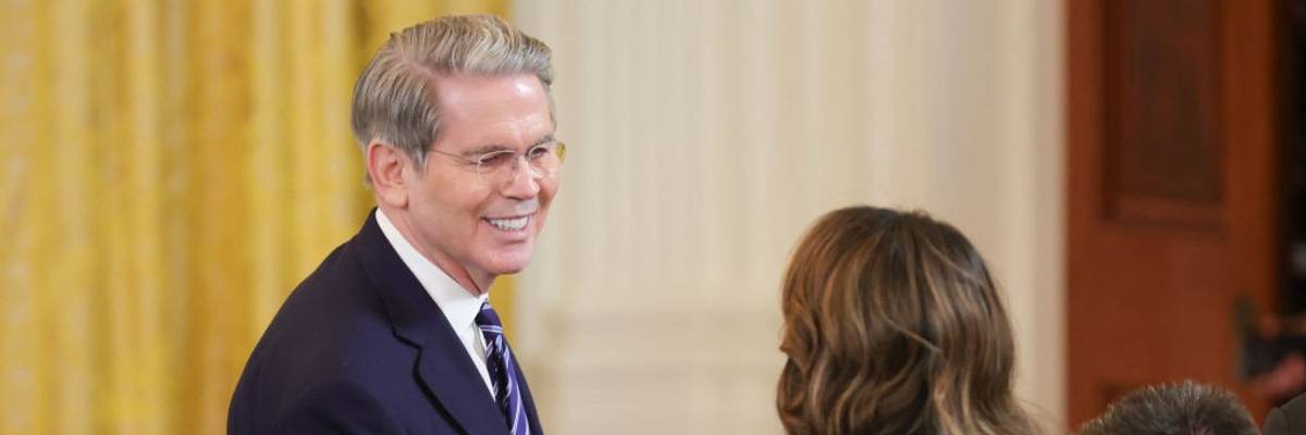 U.S. Secretary of the Treasury Scott Bessent speaks with U.S. Secretary of Homeland Security Kristi Noem