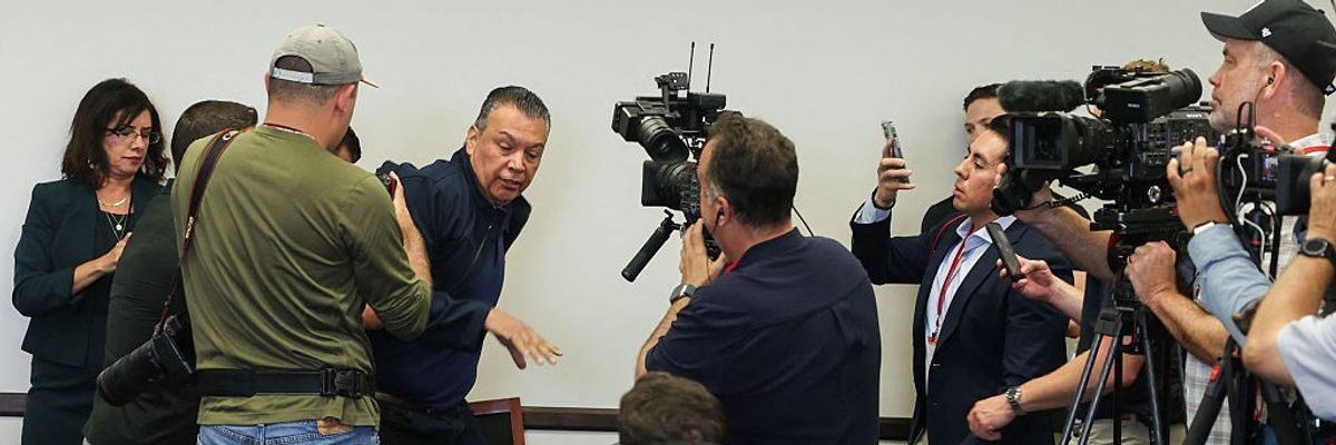 U.S. Sen. Alex Padilla removed from room.