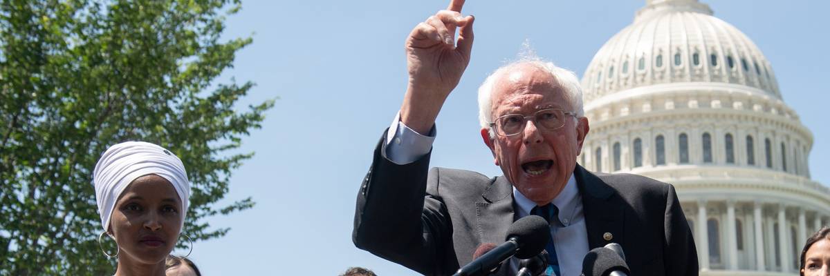 U.S. Sen. Bernie Sanders (I-Vt.) and Rep. Ilhan Omar (D-Minn.) attend a press conference