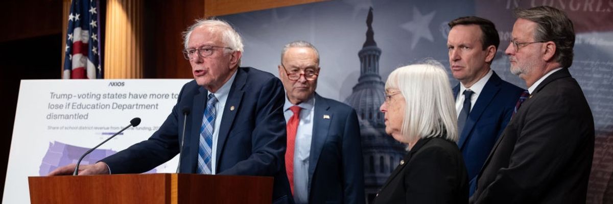 U.S. Sen. Bernie Sanders (I-Vt.) speaks with Senate Democrats
