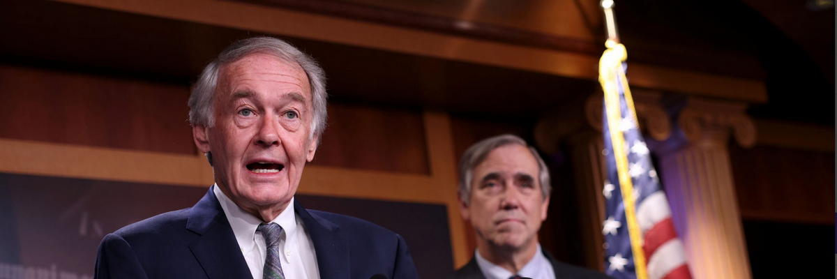 U.S. Sen. Ed Markey (D-MA) (L) and U.S. Sen. Jeff Merkley (D-OR) speak on infrastructure and climate protection at the U.S. Capitol 