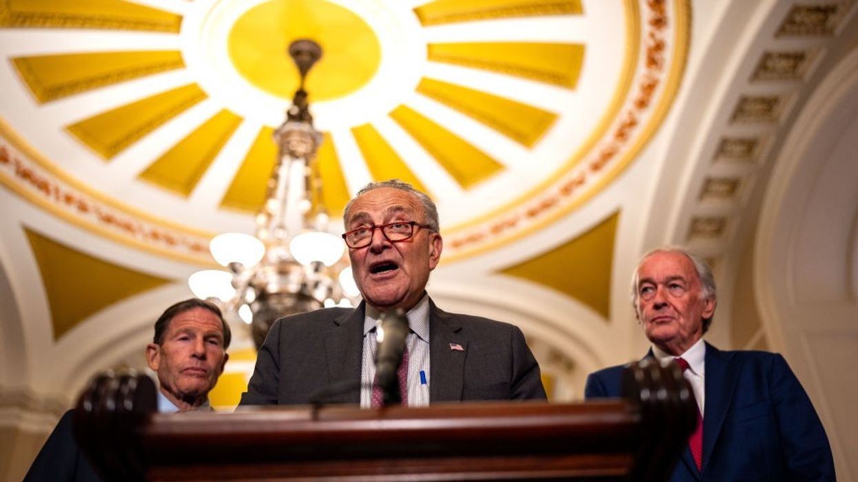 U.S. Senate Majority Leader Chuck Schumer (D-N.Y.)—flanked by Sens. Richard Blumenthal (D-Conn.) and Ed Markey (D-Mass.)