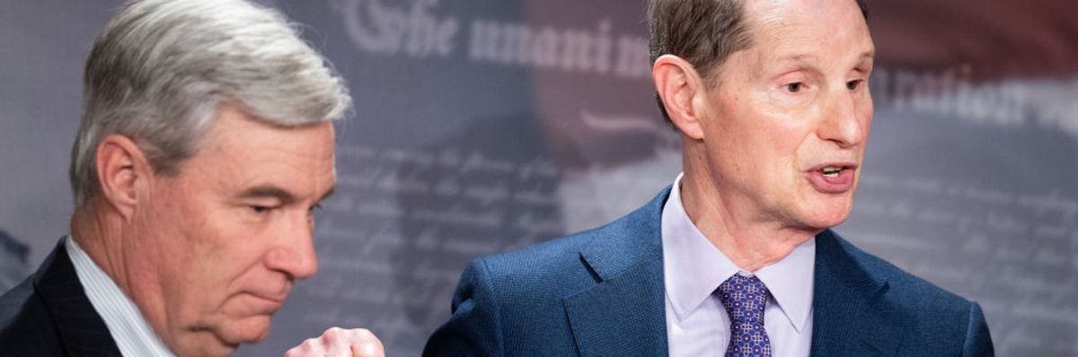 U.S. Sens. Sheldon Whitehouse (D-R.I.) and Ron Wyden (D-Ore.)