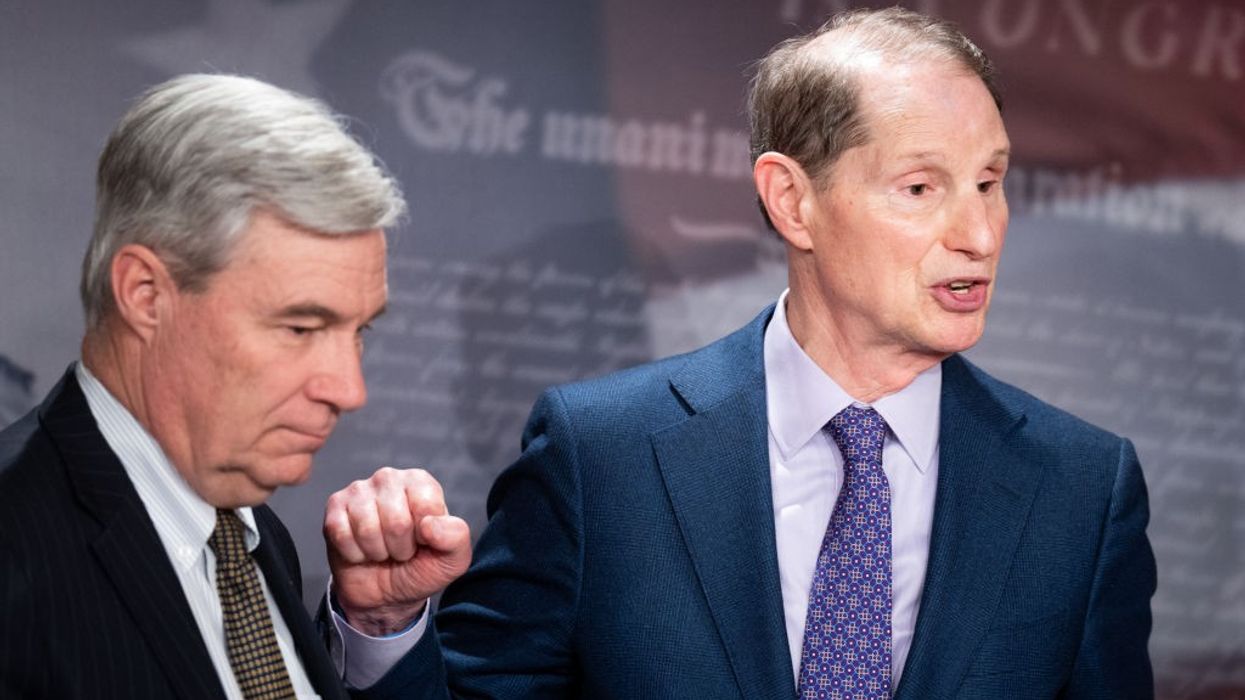 U.S. Sens. Sheldon Whitehouse (D-R.I.) and Ron Wyden (D-Ore.)