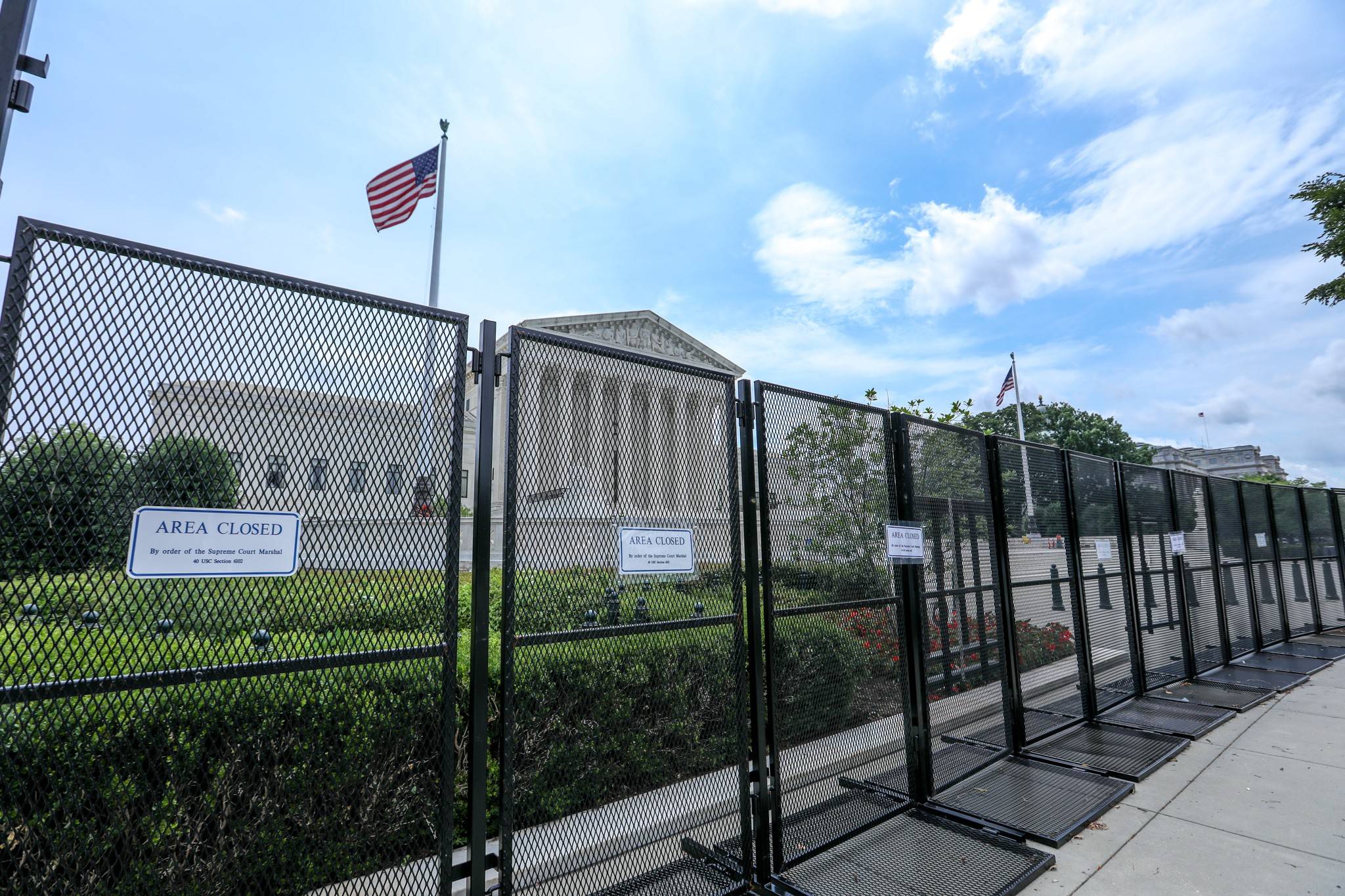 U.S. Supreme Court behind fencing.