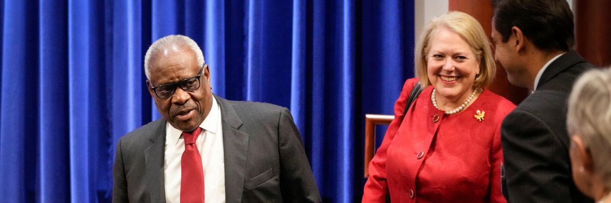U.S. Supreme Court Justice Clarence Thomas and his wife Ginni Thomas arrive at the Heritage Foundation