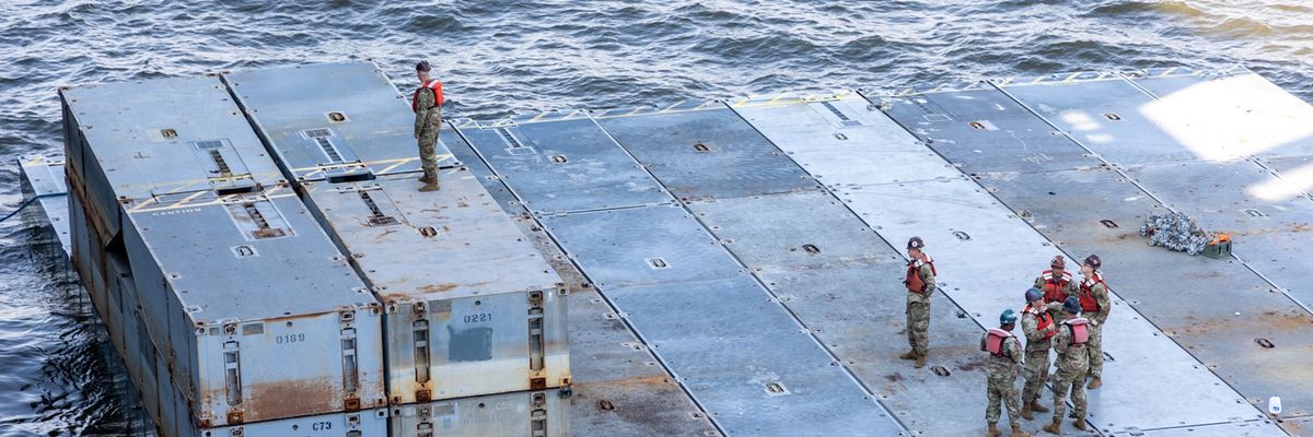 U.S. troops prepare components of the Gaza aid pier