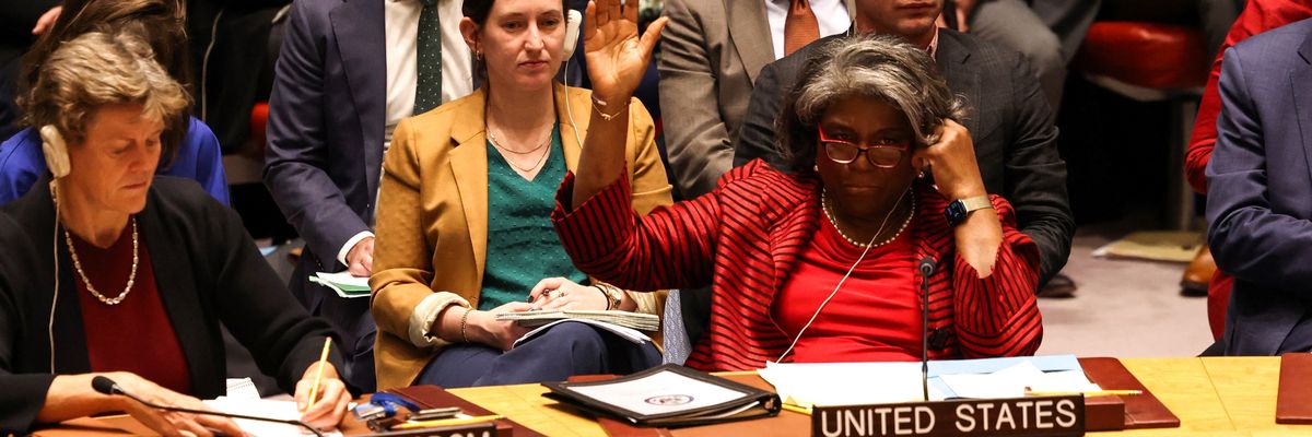 U.S. U.N. Ambassador Linda Thomas-Greenfield raises her hand to abstain 