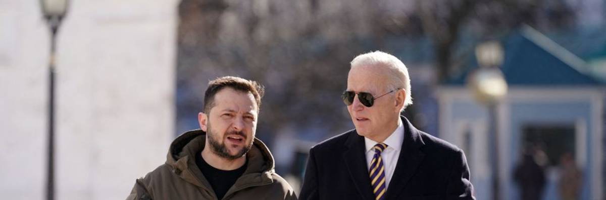 Ukrainian President Volodymyr Zelensky walks next to President Joe Biden after he arrived for a visit in Kyiv, Ukraine on February 20, 2023.
