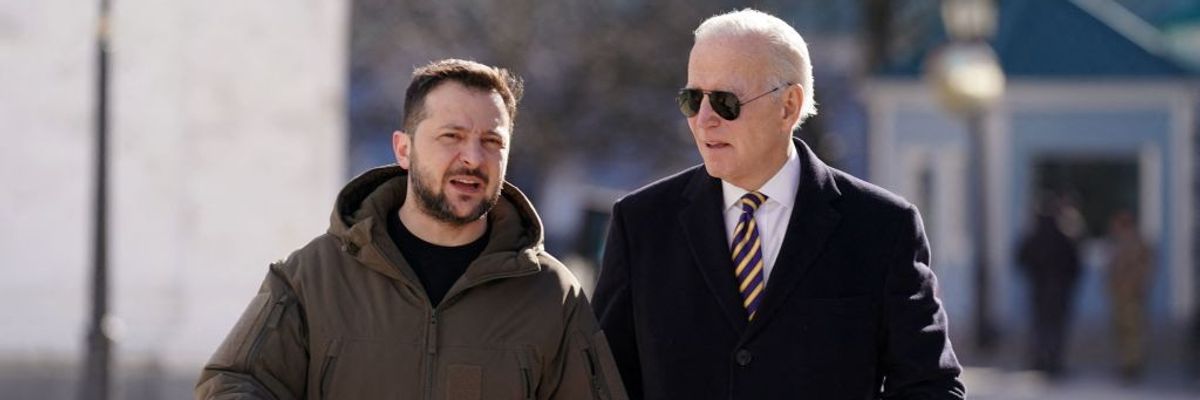 Ukrainian President Volodymyr Zelensky walks next to President Joe Biden after he arrived for a visit in Kyiv, Ukraine on February 20, 2023.