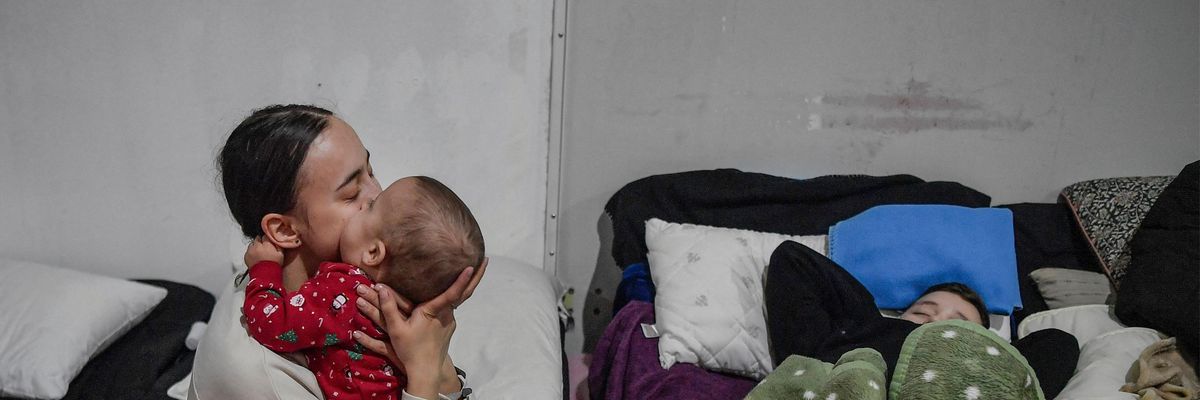 Ukrainian refugees shelter near Polish border